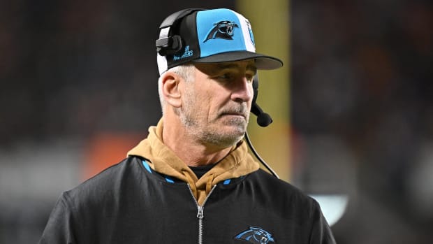 Nov 9, 2023; Chicago, Illinois, USA; Carolina Panthers head coach Frank Reich watches his team play against the Chicago Bears in the second half at Soldier Field. Mandatory Credit: Jamie Sabau-USA TODAY Sports